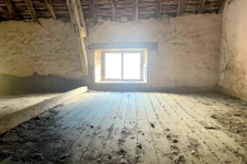 Maison de caractère dans un corps de ferme avec potentiel in