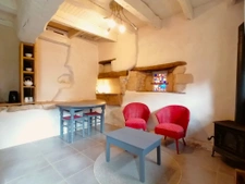 BELLE RENOVATION EN PIERRE ET POUTRES APPARENTES